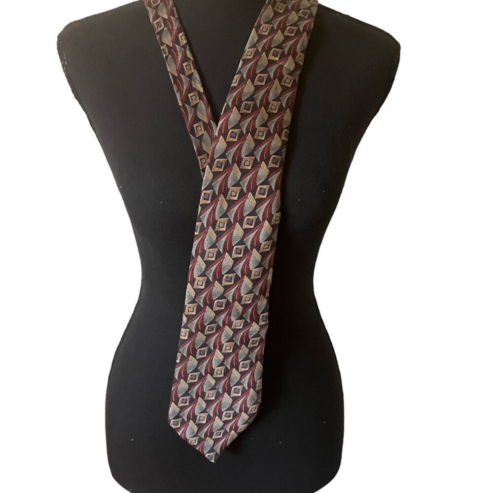 Gorgeous Patterned Tie featuring deep rich tones from Rome